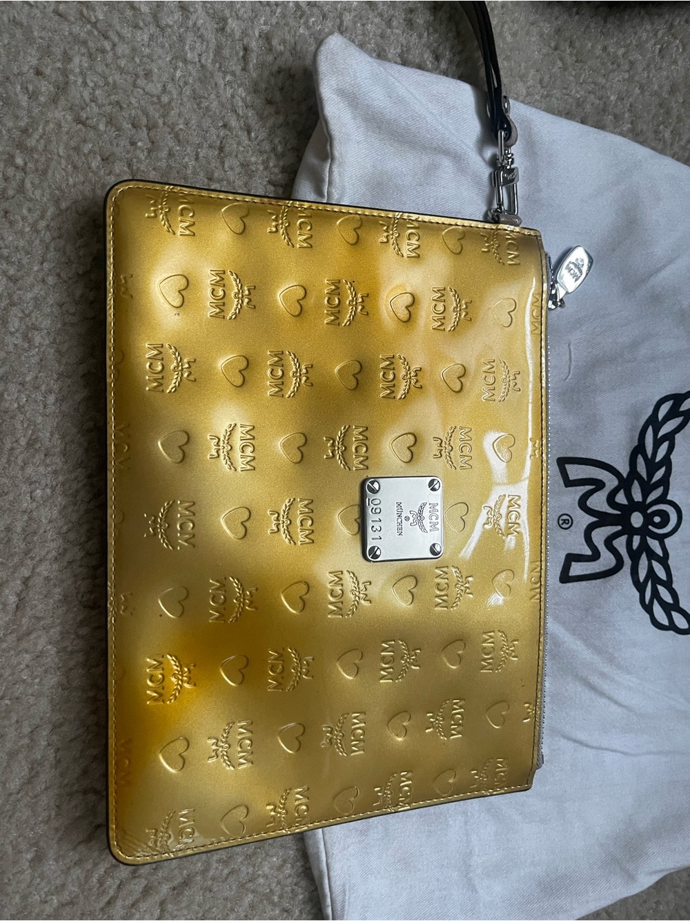 MCM Metallic Gold Embossed Heart Wristlet